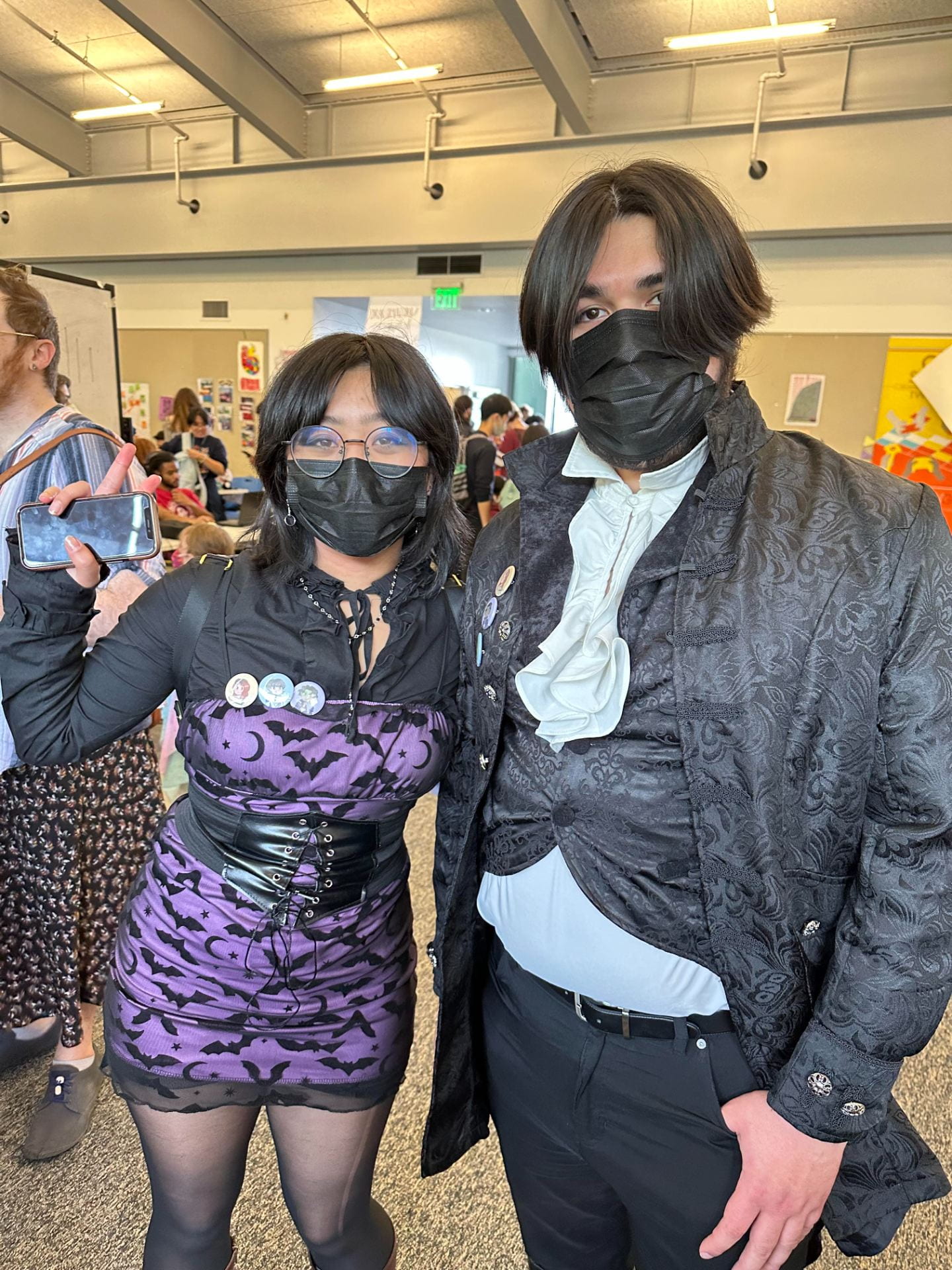 2 students dressed as vampires for Love and Other Monsters game release